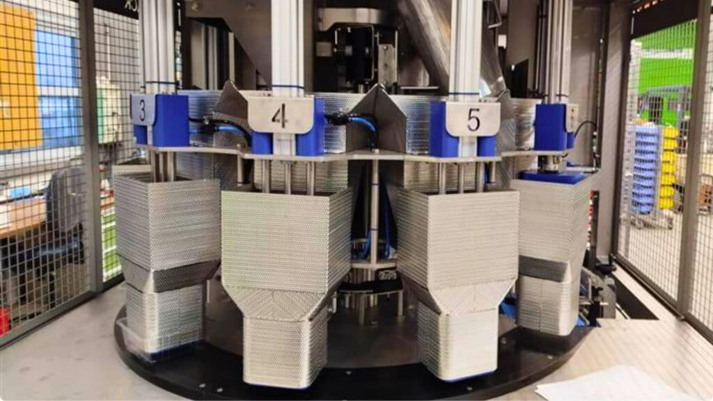 Machine de remplissage de barquettes pour l'industrie agroalimentaire